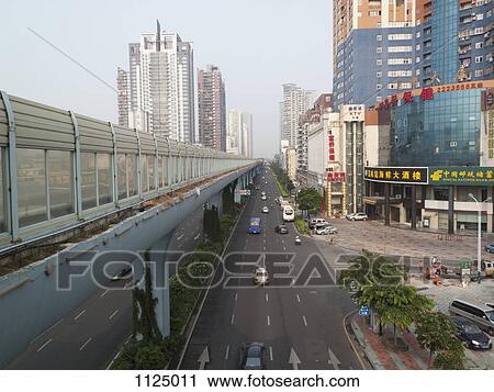 Multiple lane one way street and skyline, Xiamen, China View Large Photo Image Stock Image - Multiple lane one way street and skyline, Xiamen, China. Fotosearch