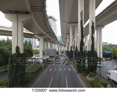 Multiple lane one way street in Shanghai, China View Large Photo Image Stock Photo - Multiple lane one way street in Shanghai, China. Fotosearch