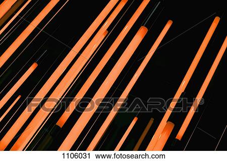 Neon orange rods of glowing light View Large Photo Image Stock Image - Neon orange rods of glowing light. Fotosearch