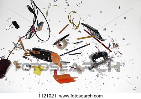 Office supplies against a white background View Large Photo Image Stock Image - Office supplies against a white background. Fotosearch