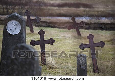 Old tombstones in a cemetery View Large Photo Image Stock Photo - Old tombstones in a cemetery. Fotosearch