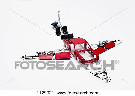 Parts of a model car arranged in the form of an airplane View Large Photo Image Stock Image - Parts of a model car arranged in the form of an airplane. Fotosearch
