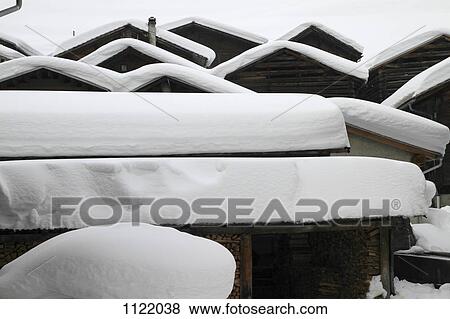 Patterns of snow-capped cabins View Large Photo Image Stock Photo - Patterns of snow-capped cabins. Fotosearch