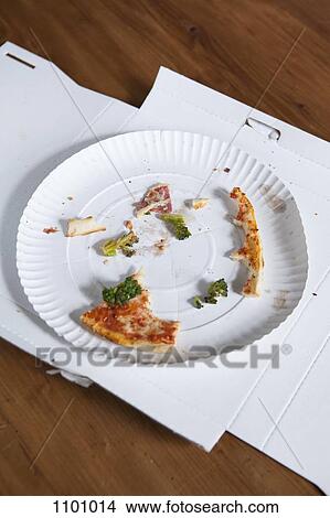 Pizza crusts on a paper plate in a cardboard box View Large Photo Image Picture - Pizza crusts on a paper plate in a cardboard box. Fotosearch