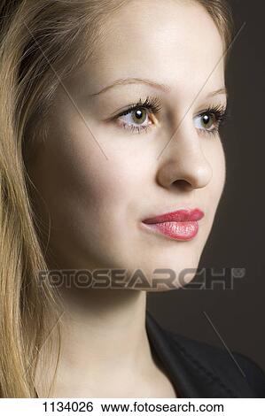 Stock Photograph - Portrait of young woman. Fotosearch