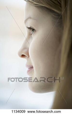 Profile of young woman View Large Photo Image Stock Photo - Profile of young woman. Fotosearch