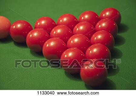 Stock Image - Racked snooker balls on a pool table. Fotosearch