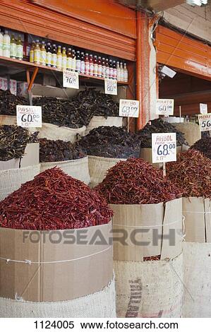 Stock Photography - Sacks of various dried chili peppers for sale at an Merced Market, Mexico City. Fotosearch