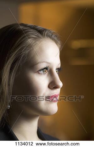 Shadowed profile of young woman View Large Photo Image Stock Image - Shadowed profile of young woman. Fotosearch