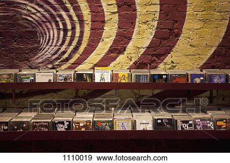 Shelves of compact discs in a record shop View Large Photo Image Stock Photo - Shelves of compact discs in a record shop. Fotosearch
