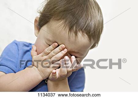 Shy child View Large Photo Image Stock Photo - Shy child. Fotosearch