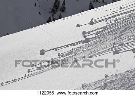 Small avalanches forming on the snow covered slopes View Large Photo Image Stock Photography - Small avalanches forming on the snow covered slopes. Fotosearch