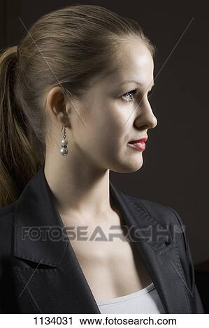 Stock Image - Smartly dressed young woman. Fotosearch