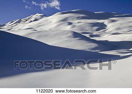 Smooth blanket of snow over hills View Large Photo Image Stock Image - Smooth blanket of snow over hills. Fotosearch