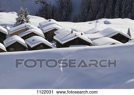 Snow-capped cabins View Large Photo Image Stock Image - Snow-capped cabins. Fotosearch