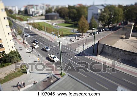 Street scene in a residential district, tilt-shift, Berlin, Germany View Large Photo Image Stock Photograph - Street scene in a residential district, tilt-shift, Berlin, Germany. Fotosearch