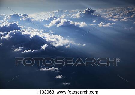 Sunbeams on a cloudscape View Large Photo Image Stock Image - Sunbeams on a cloudscape. Fotosearch