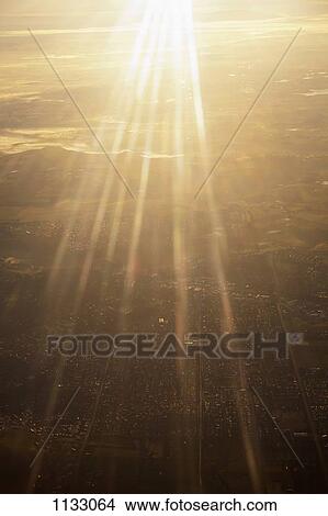 Picture - Sunbeams shining down on Melbourne, Australia. Fotosearch