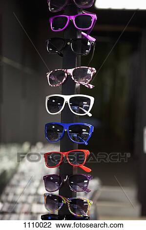 Sunglasses on display in a store View Large Photo Image Stock Image - Sunglasses on display in a store. Fotosearch