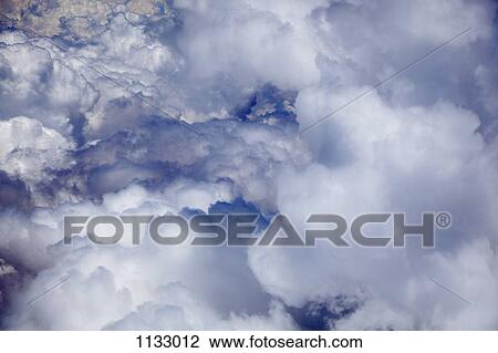 Sunlight on a cloudscape, full frame View Large Photo Image Stock Image - Sunlight on a cloudscape, full frame. Fotosearch