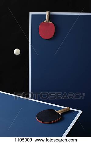 Table tennis tables, bats and a ball mid-air View Large Photo Image Stock Photo - Table tennis tables, bats and a ball mid-air. Fotosearch