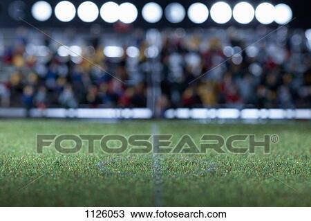 The center field of a miniature soccer field, spectator figurines in background View Large Photo Image Stock Image - The center field of a miniature soccer field, spectator figurines in background. Fotosearch