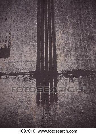 Tire marks on a road surface View Large Photo Image Stock Image - Tire marks on a road surface. Fotosearch