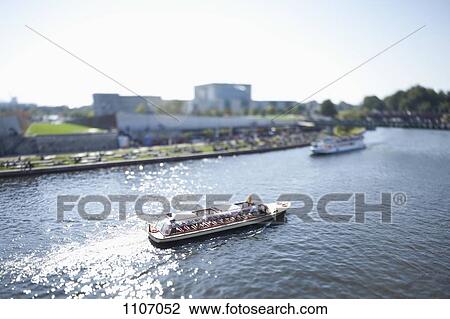 Tour boats on the Spree River, Germany, tilt-shift View Large Photo Image Stock Image - Tour boats on the Spree River, Germany, tilt-shift. Fotosearch
