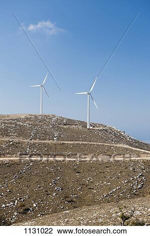 Two wind turbines on a hill, Rhodes, Greece View Large Photo Image Stock Image - Two wind turbines on a hill, Rhodes, Greece. Fotosearch