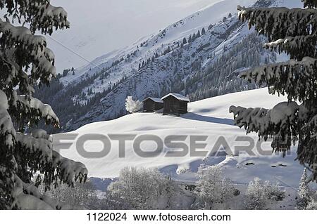 Two winter chalets by the mountain View Large Photo Image Picture - Two winter chalets by the mountain. Fotosearch