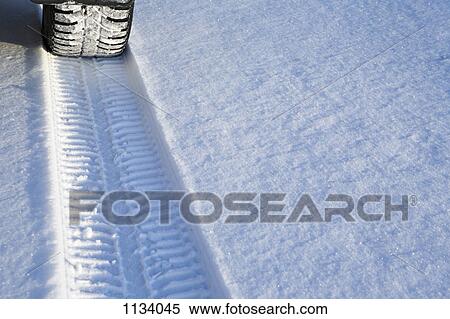 Tyre track on snow View Large Photo Image Stock Photography - Tyre track on snow. Fotosearch