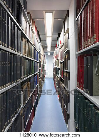 View down an aisle in a library View Large Photo Image Stock Image - View down an aisle in a library. Fotosearch