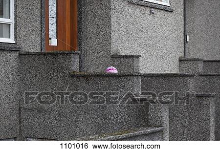 View of the knitted hat of a child in front of a building View Large Photo Image Stock Photograph - View of the knitted hat of a child in front of a building. Fotosearch