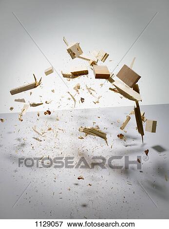 Stock Photo - Wood exploding into pieces. Fotosearch