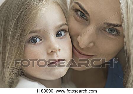 A beautiful young girl and her mother, close-up View Large Photo Image Stock Image - A beautiful young girl and her mother, close-up. Fotosearch