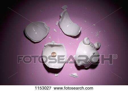 Stock Photo - A broken piggy bank with only one Euro cent. Fotosearch