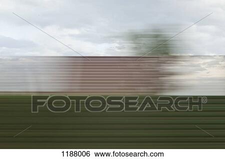A building and sky in blurred abstract pattern seen from moving train View Large Photo Image Stock Photograph - A building and sky in blurred abstract pattern seen from moving train. Fotosearch