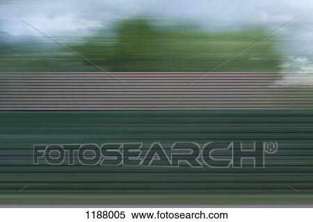 A building, trees and clouds in abstract blurred pattern viewed from moving train View Large Photo Image Stock Photography - A building, trees and clouds in abstract blurred pattern viewed from moving train. Fotosearch