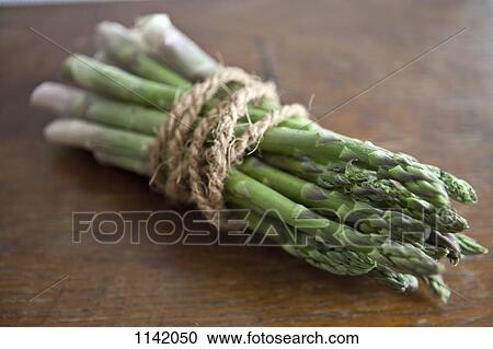 A bundle of asparagus View Large Photo Image Stock Image - A bundle of asparagus. Fotosearch