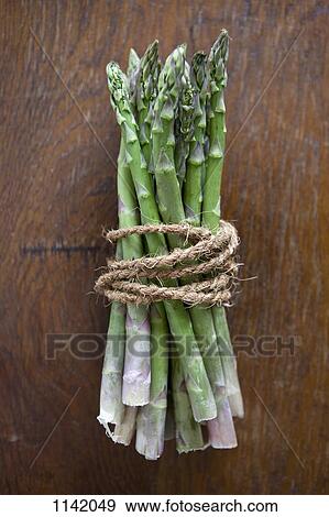 Stock Photo - A bundle of asparagus. Fotosearch