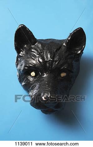 Stock Image - A ceramic head of a dog. Fotosearch