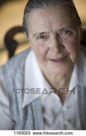 A cheerful senior woman, close-up View Large Photo Image Stock Image - A cheerful senior woman, close-up. Fotosearch
