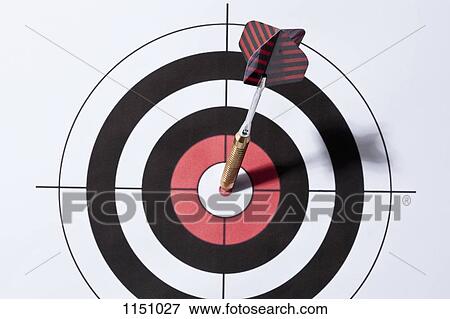 A dart in the bull's eye of a target View Large Photo Image Stock Photo - A dart in the bull's eye of a target. Fotosearch