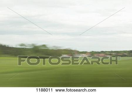 A distant village in blurred motion viewed from moving train View Large Photo Image Stock Image - A distant village in blurred motion viewed from moving train. Fotosearch