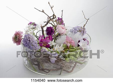 A glass bowel vase with an arrangement of various flowers View Large Photo Image Stock Image - A glass bowel vase with an arrangement of various flowers. Fotosearch