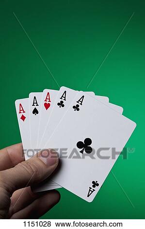 A hand holding five aces fanned out View Large Photo Image Stock Photo - A hand holding five aces fanned out. Fotosearch