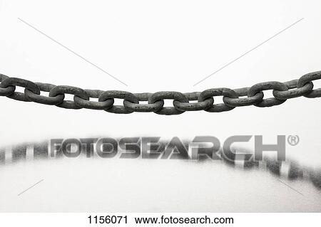 A hanging heavy metal chain View Large Photo Image Stock Image - A hanging heavy metal chain . Fotosearch