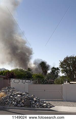 A house in a suburb on fire View Large Photo Image Picture - A house in a suburb on fire. Fotosearch