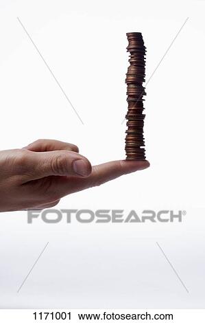 A human finger balancing a stack of various Euro coins, close-up View Large Photo Image Stock Image - A human finger balancing a stack of various Euro coins, close-up. Fotosearch