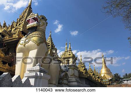 A lion statue in front of Shwedagon Pagoda, Yangon, Burma View Large Photo Image Stock Image - A lion statue in front of Shwedagon Pagoda, Yangon, Burma. Fotosearch